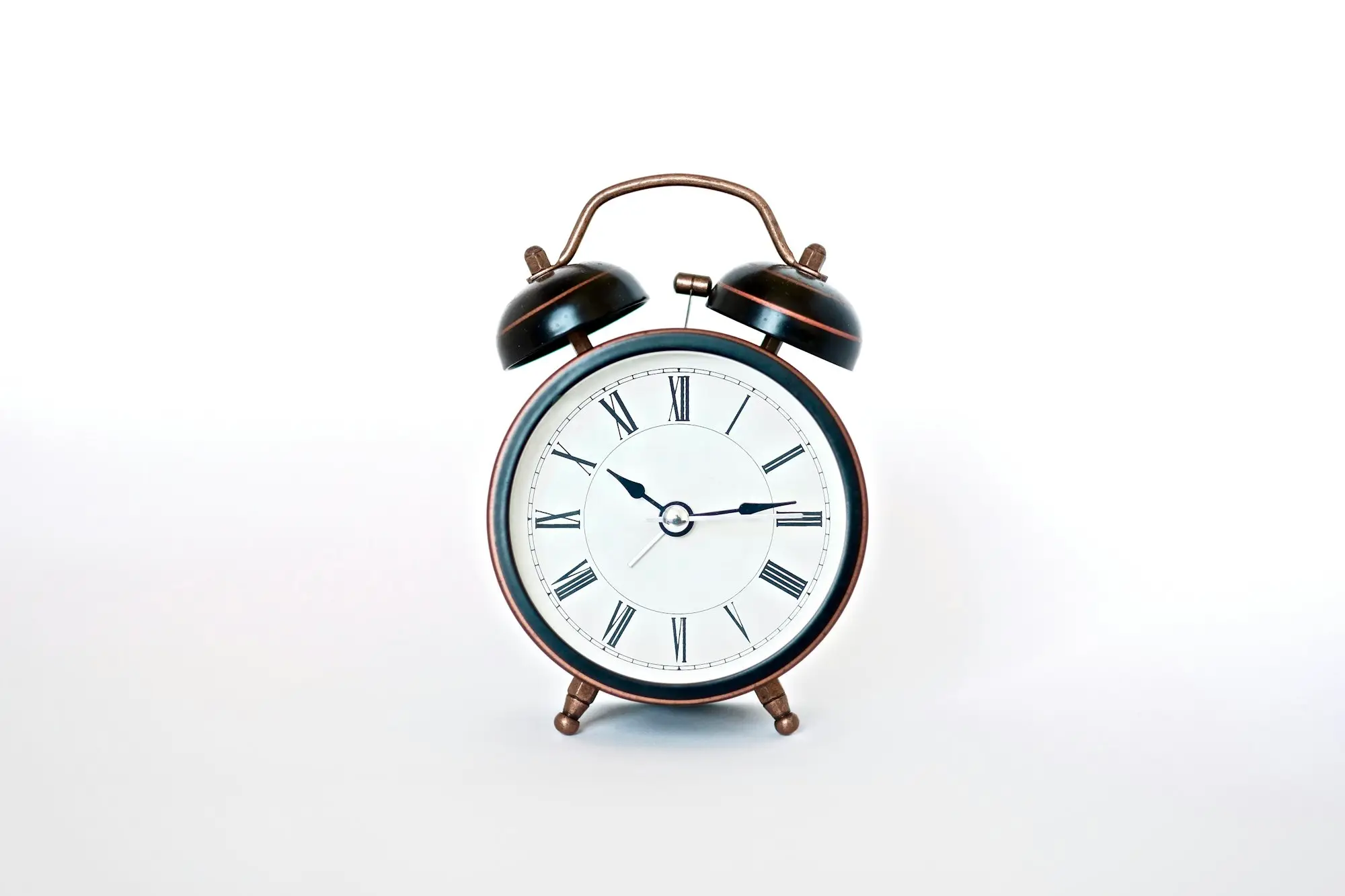 Black and white alarm clock, standing for business finance needed quickly