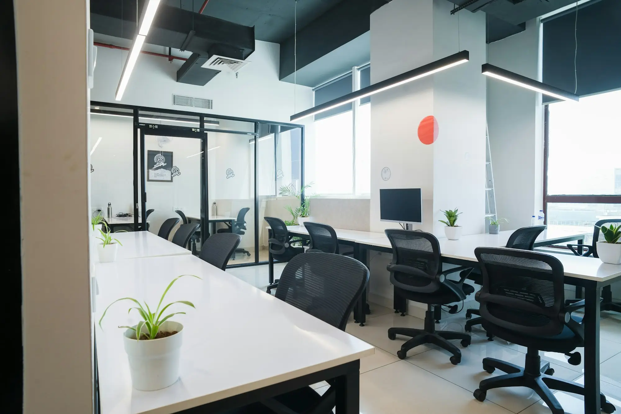 Modern open plan office space where a business compares its loan options